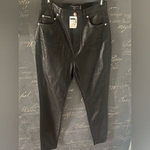 DOLCE & GABBANA
Grace Coated Denim Skinny Jeans